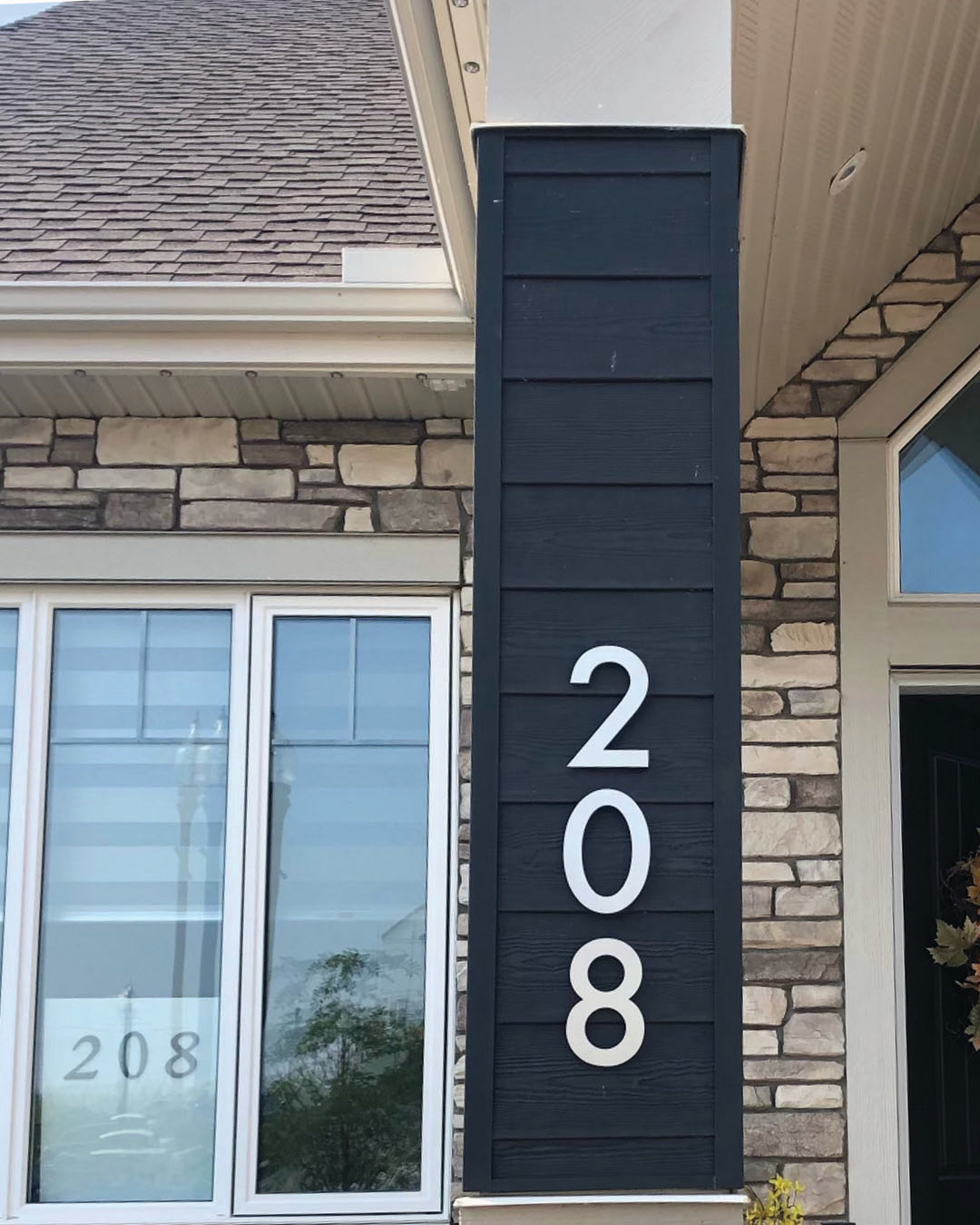 vertical Aluminum Floating House Numbers installed on dark colour pillar